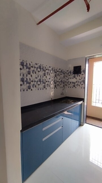 Kitchen in 2 BHK Apartment at Raunak City Phase 2, Kalyan West – for Sale