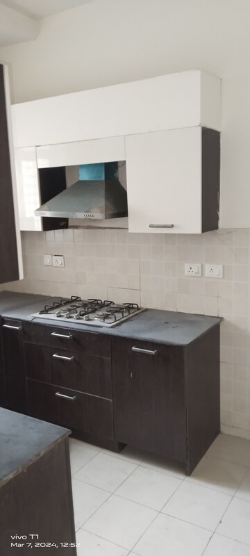 Kitchen in 3 BHK Builder Floor at Ansal API Esencia, Sector 67 – for Sale