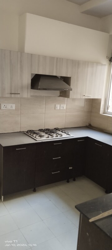 Kitchen in 3 BHK Builder Floor at Ansal API Esencia, Sector 67 – for Sale