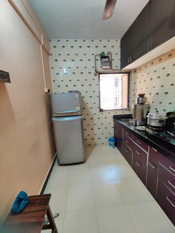 Kitchen in 2 BHK Apartment at Himgiri CHS Shivai Nagar, Shivai Nagar – for Sale