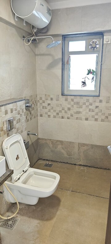 Bathroom in 3 BHK Apartment at Acropolis CHS, Vile Parle West – for Rent