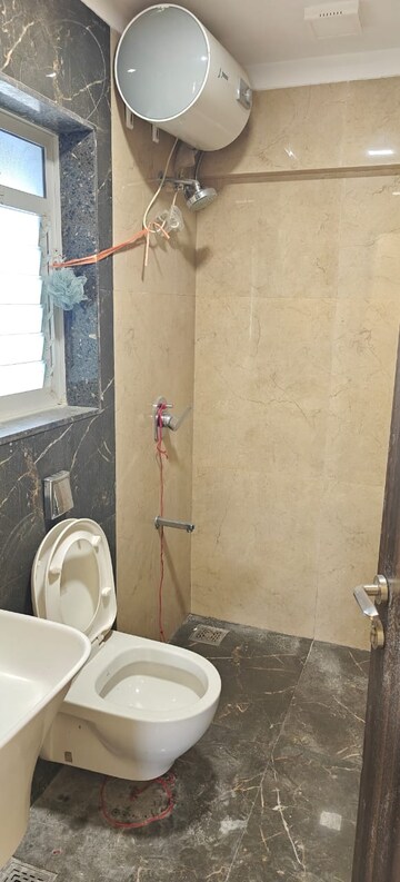 Bathroom in 3 BHK Apartment at Acropolis CHS, Vile Parle West – for Rent