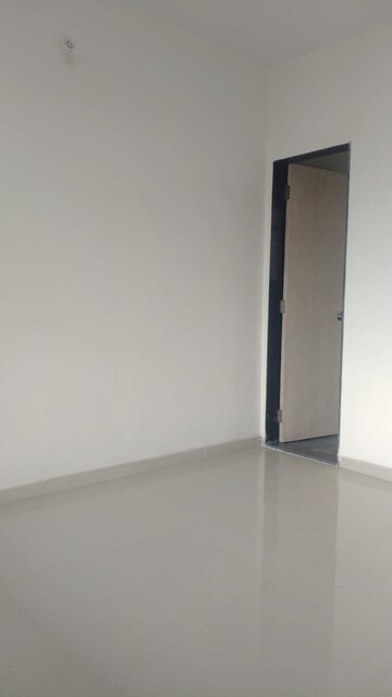 Bedroom in 2 BHK Apartment at Balaji Paradise, Dhayari – for Sale