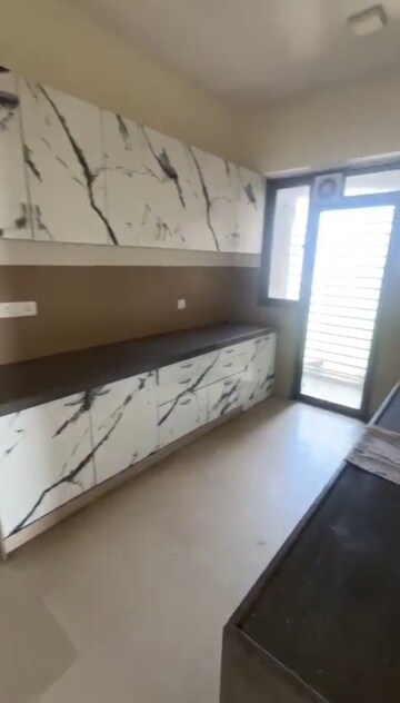 Kitchen in 3 BHK Apartment at Bhimjyani Verraton, Manpada – for Sale