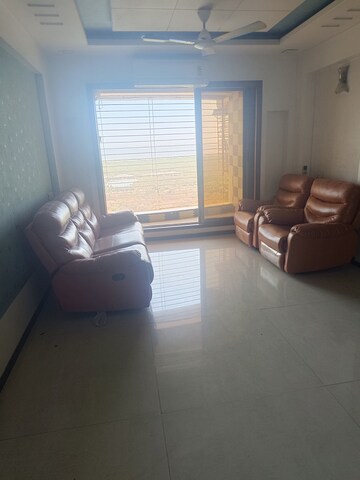 Living Room in 2 BHK Apartment at The Wadhwa Palm Beach Residency, Nerul – for Rent