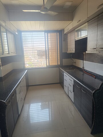 Kitchen in 2 BHK Apartment at The Wadhwa Palm Beach Residency, Nerul – for Rent