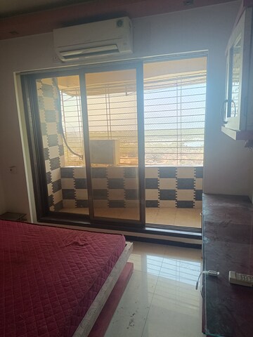 Room in 2 BHK Apartment at The Wadhwa Palm Beach Residency, Nerul – for Rent