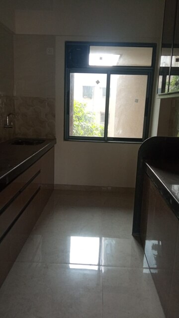 Kitchen in 1 BHK Apartment at Dosti Vihar, Samata Nagar – for Sale