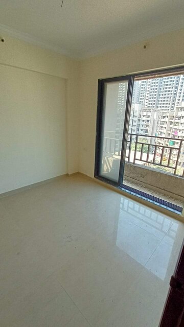 Room in 1 BHK Apartment at Raunak City 3, Kalyan West – for Sale