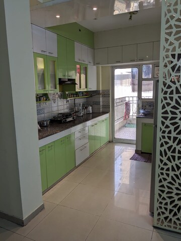 Kitchen in 3 BHK Apartment at Mahagun Mywoods, Sector 16c Greater Noida – for Sale