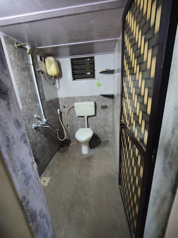 Bathroom in 2 BHK Apartment at Soham Parijat Gardens, Ghodbunder Road – for Sale