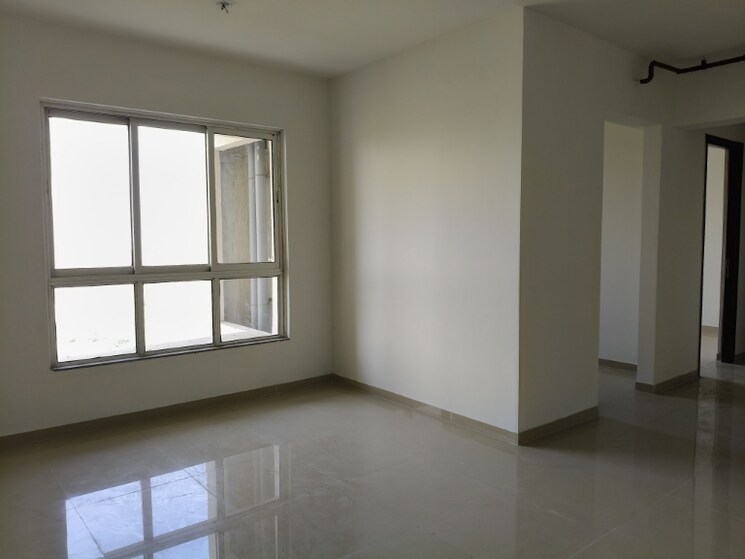 Living Room, puraniks-city-reserva 2 Bedroom 627 Sq.Ft. Apartment In Ghodbunder Road Thane 7871220