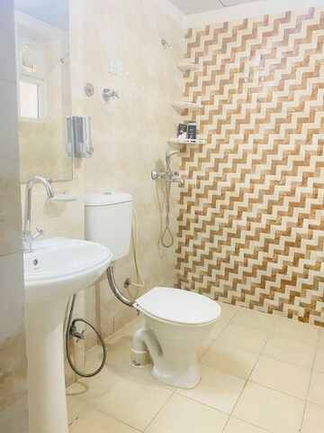 Bathroom in 2 BHK Apartment at Mahagun Mywoods, Sector 16c Greater Noida – for Sale