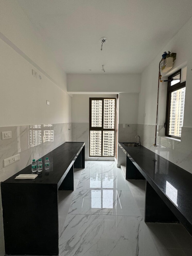 Kitchen, raymond-ten-x-habitat 2 Bedroom 635 Sq.Ft. Apartment In Swastik Garden Thane 7871912