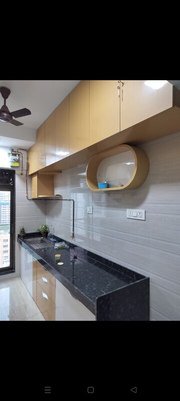 Kitchen in 2 BHK Apartment at Je And Vee Om Trimurti, Malad East – for Rent