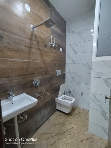 Bathroom in 3 BHK Builder Floor at Dwarka Mor – for Rent