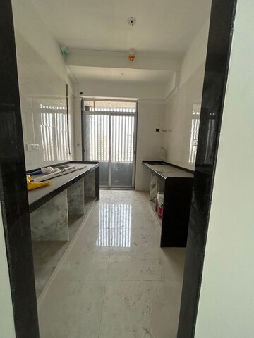 Kitchen in 2 BHK Apartment at Shreeji Atlantis, Malad West – for Sale