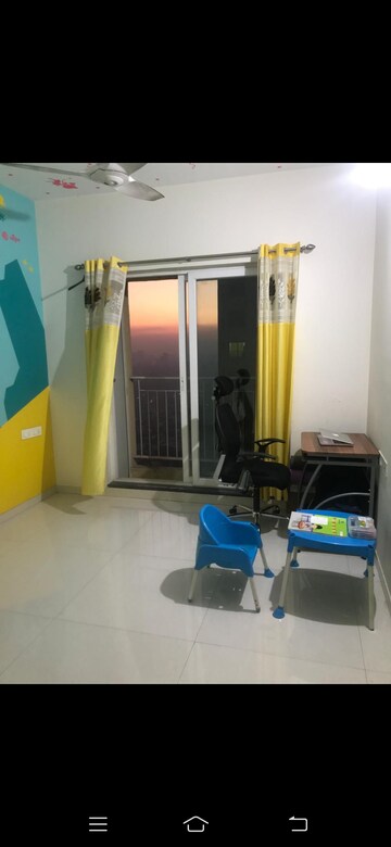 Living Room in 2 BHK Apartment at Rustomjee Urbania, Majiwada – for Rent