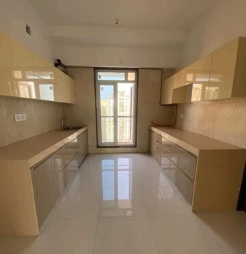 Kitchen in 4 BHK Apartment at Sheth Avalon Phase 2, Majiwada – for Rent