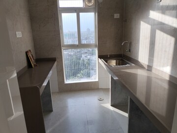 Kitchen in 1 BHK Apartment at Mahindra Roots, Kandivali East – for Rent