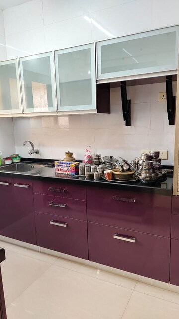 Kitchen in 2 BHK Apartment at Amritvan Complex, Aarey Colony – for Sale