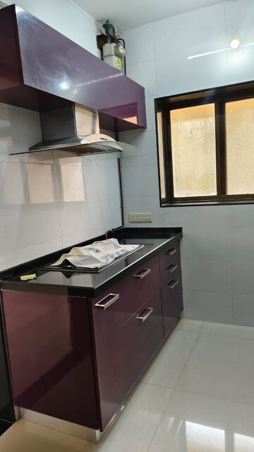 Kitchen in 2 BHK Apartment at Amritvan Complex, Aarey Colony – for Sale