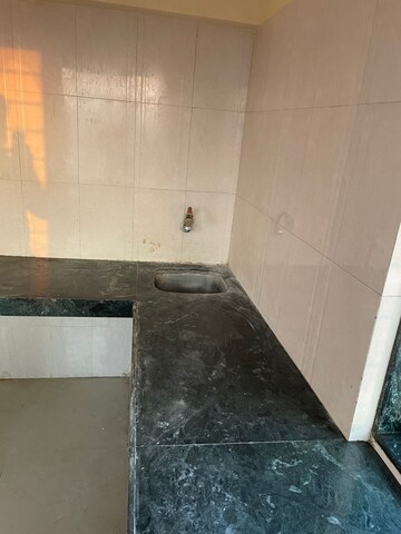 Kitchen in 2 BHK Apartment at Andheri CHS, Andheri West – for Rent