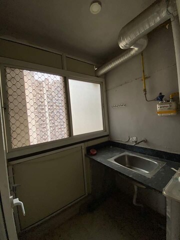 Kitchen in 3 BHK Apartment at Supertech Ecovillage II, Sector 16b Greater Noida – for Sale