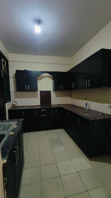 Kitchen in 3 BHK Apartment at Amrapali Village ii, Nyay Khand – for Rent