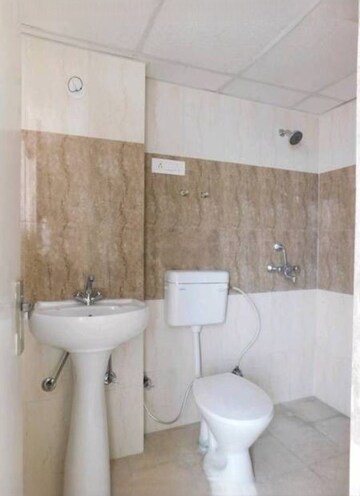 Bathroom in 2 BHK Apartment at Nilaya Greens, Raj Nagar Extension – for Sale