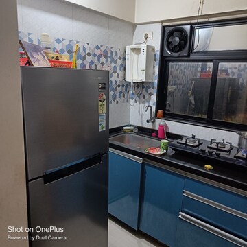 Kitchen in 1 BHK Apartment at Unnathi Woods Phase 1 And 2, Ghodbunder Road – for Sale