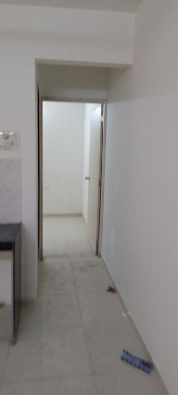Building Lobby in 1.5 BHK Apartment at Green Heritage House, Andheri East – for Sale