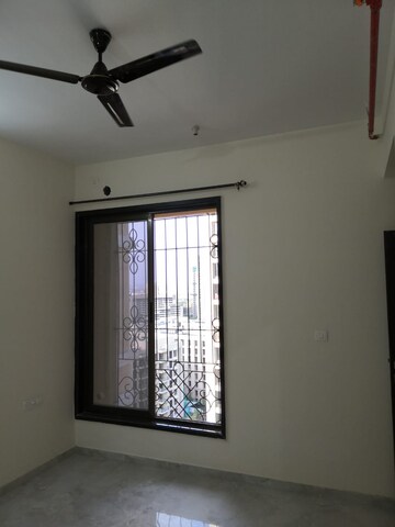 Room in 2 BHK Apartment at Gala Pride Palms, Kolshet Road – for Sale