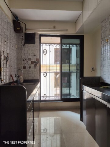 Kitchen in 1 BHK Apartment at Tilak Nagar Building, Tilak Nagar – for Sale