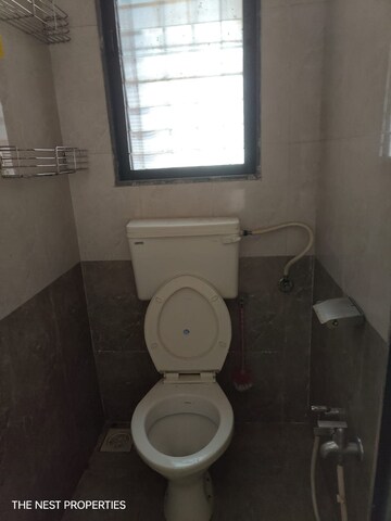 Bathroom in 1 BHK Apartment at Tilak Nagar Building, Tilak Nagar – for Sale