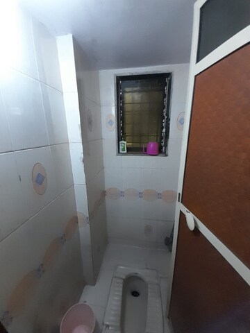 Bathroom in 1 BHK Apartment at Mansi Arcade, Dombivli West – for Rent
