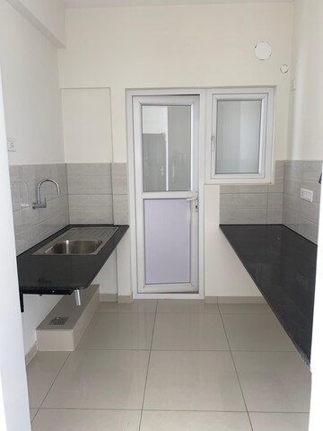 Kitchen in 2 BHK Apartment at Provident Too Good Homes, Thanisandra Main Road – for Sale
