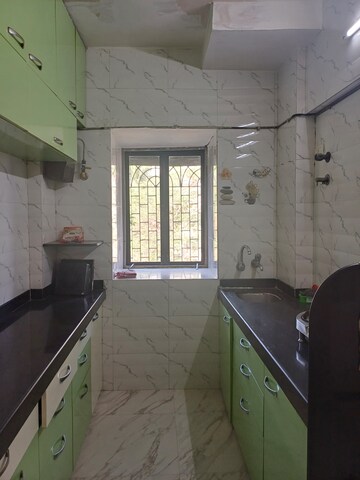 Kitchen in 1 BHK Apartment at New Jay Palace, Yari Road – for Rent