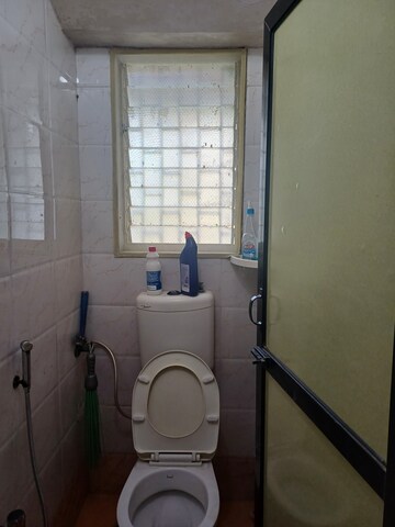 Bathroom in 1 BHK Apartment at New Jay Palace, Yari Road – for Rent