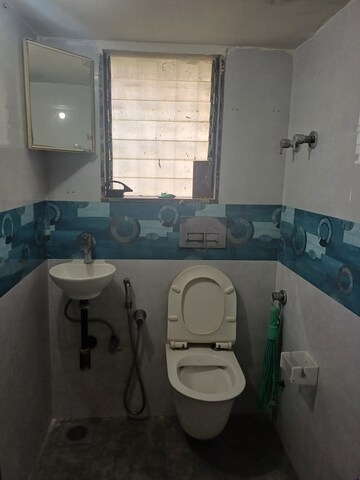 Bathroom in 1 BHK Apartment at New Jay Palace, Yari Road – for Rent