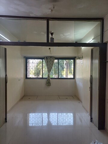 Building Lobby in 1 BHK Apartment at New Jay Palace, Yari Road – for Rent