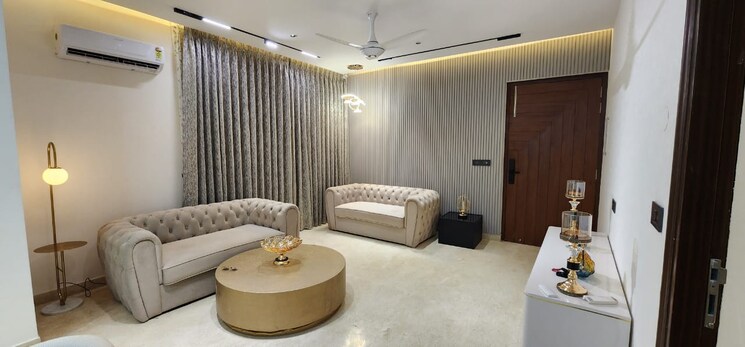 Living Room, maya-green-lotus-saksham 5 Bedroom 3350 Sq.Ft. Apartment In International Airport Road Zirakpur 7877361