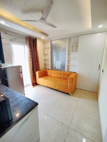 Living Room in 1 BHK Apartment at Ramky Towers, Gachibowli – for Rent