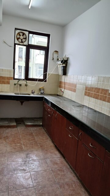 Kitchen in 2 BHK Apartment at Cosmos Executive, Sector 3 – for Rent