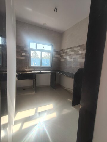 Kitchen in 1 BHK Apartment at Mountain Greens, Kalyan East – for Sale