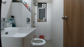 Bathroom in 1 BHK Apartment at Godrej Tranquil, Kandivali East – for Rent