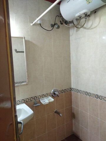 Bathroom in 2 BHK Apartment at Lokhandwala Whispering Palms, Kandivali East – for Rent