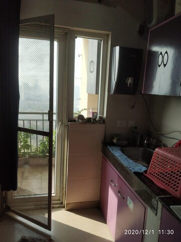Kitchen in 3 BHK Apartment at Paramount Floraville, Sector 137 – for Sale
