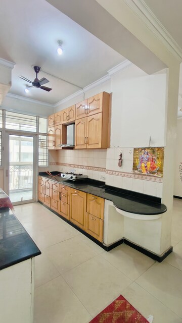 Kitchen in 3 BHK Apartment at Mahagun Mansion I and II, Vaibhav Khand – for Rent