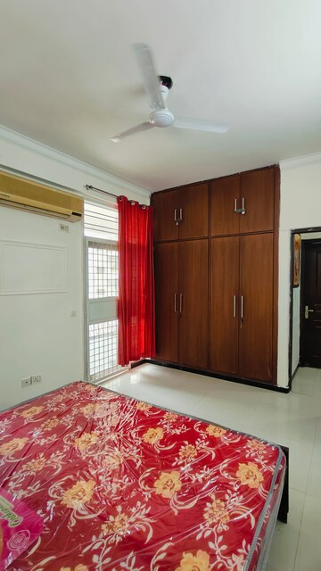 Bedroom in 3 BHK Apartment at Mahagun Mansion I and II, Vaibhav Khand – for Rent